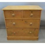 A 19th Century Pine Chest, the moulded top above two short and two long drawers with knob handles