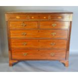 A 19th Century Mahogany Shell and Line Inlaid Large Straight Front Chest with five short and three