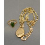 A 9ct. Gold Locket with 9ct. Gold Chain together with a 10ct. gold stone set ring, 14.8 gms