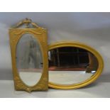 A 19th Century Gilt Framed Wall Mirror together with another similar oval gilt framed wall mirror