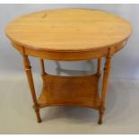 An Early 20th Century Good Quality Mahogany Two Tier Occasional Table by Waring & Gillow, with a