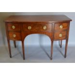 A 19th Century Mahogany Bow Fronted Sideboard, with a central drawer flanked by two drawers and a