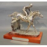 A 925 Silver Large Model in the form of a Jockey upon a Horse jumping a Fence on rectangular