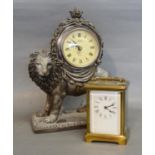 A French Brass Cased Carriage Clock, the enamel dial with Roman numerals and with lever escapement