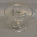 An 18th Century Glass Tazza with shaped stem and domed folded foot, 23cms diameter