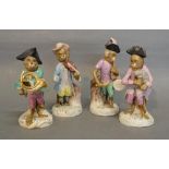 A German Porcelain Four Piece Monkey Band, 14cms tall