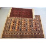 A North West Persian Woollen Rug with an all over design upon a blue and cream ground within