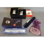 A Swarovski Active Crystals Pen together with another similar, two other items of Swarovski and