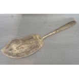 A Continental White Metal Fish Slice, the blade embossed with a fish within a pierced border, 35 cms