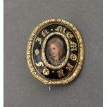 A 19th Century Yellow Metal Oval Mourning Brooch with central Hand Painted Panel, a classical