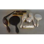 A Birmingham Silver Five Piece Dressing Table Set, comprising of three brushes, a hand mirror and