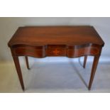 A Mahogany Serpentine Marquetry and Line Inlaid Tea Table, the hinged top above an inlaid shaped