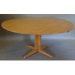From The Barnsley Workshop and Designed By Edward Barnsley a large circular Elm Dining Table,