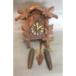 An Austrian Carved Cuckoo Clock