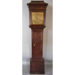 A George III Oak Long Case Clock the Pagoda Hood with turned pilasters, above a rectangular panel