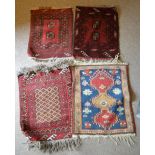 A Small North West Persian Woollen Mat, together with three other similar woollen mats