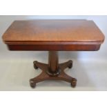 A 19th Century Mahogany Card Table, the hinged top enclosing a baise lined interior above a turned