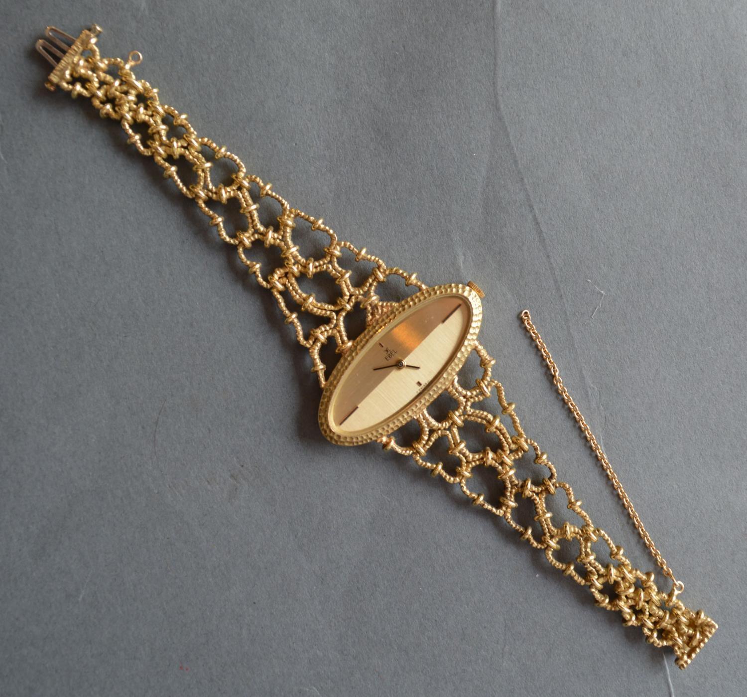 An 18ct. Gold Cased Ladies Wristwatch by Ebel with shaped pierced bracelet, 52.2 gms all in