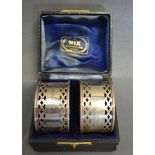 A Pair of Birmingham Silver Napkin Rings within fitted box