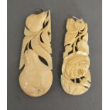 A Late 19th To Early 20th Century Chinese Carved Ivory Large Pendant, together with another similar,