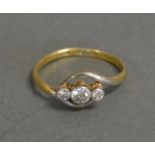 An 18ct. Gold Three Stone Diamond Ring