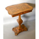 A 19th Century Marquetry Inlaid Work Table, the hinge top enclosing a fitted interior, raised upon a