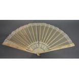 A 19th Century Chinese Carved Ivory and Lacework Fan, 38 cm long