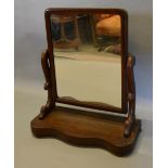 A Victorian Mahogany Swing Frame Toilet Mirror with serpentine base together with a set of six