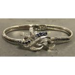 An 18ct. White Gold Diamond and Sapphire Bracelet, set with two rows of sapphire and many diamonds
