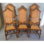 A Set Of Six, Four Plus Two Queen Anne Style High Back Dining Chairs each with a cane back and seat,