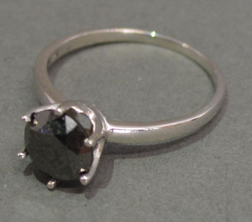 A 10 ct. White Gold Solitaire Black Diamond Ring Claw Set approximately 2 ct.