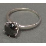 A 10 ct. White Gold Solitaire Black Diamond Ring Claw Set approximately 2 ct.