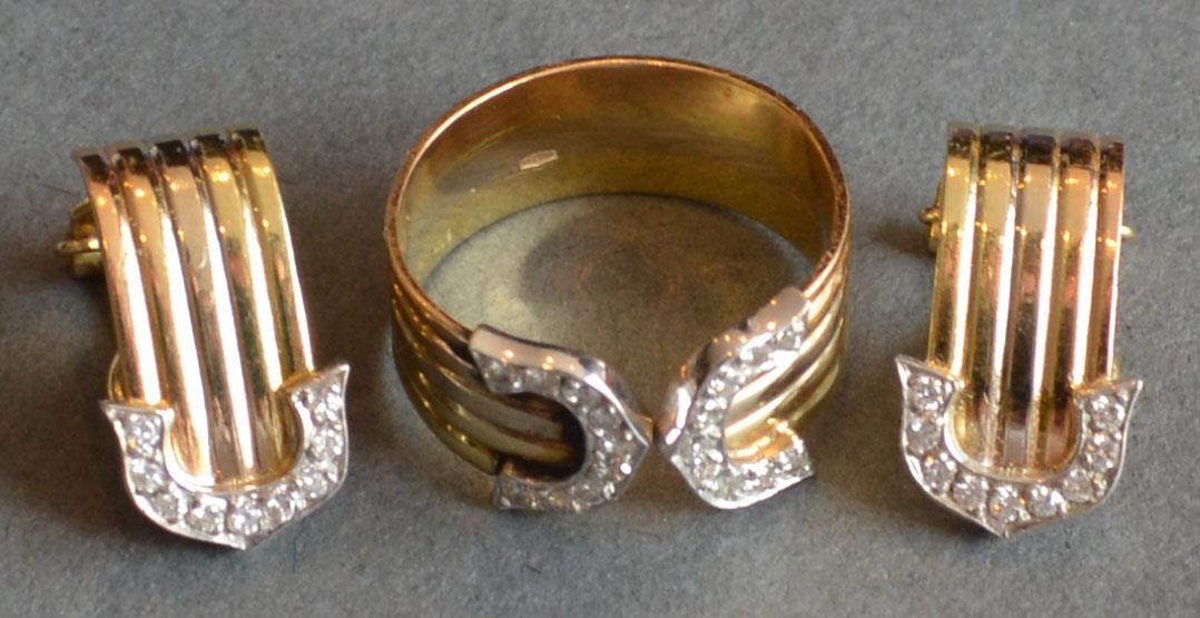 An18ct. Gold Ring Set With Two Rows of Diamonds, together with a pair of matching 18ct. gold ear