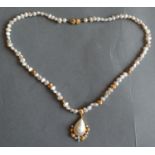 An 18ct. Gold, Pearl and Diamond Set Pendant, together with a similar pearl and gold linked chain