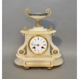 A 19th Century Alabaster Clock The Enamel Dial With Roman Numerals and two train movement, 28cm tall