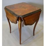 A French Kingwood Parquetry Inlaid and Gilt Metal Mounted Centre Table with four drop flaps raised