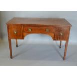 A 19th Century Mahogany Writing Desk With A Line Inlaid Top above a central drawer flanked by