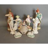 A Pair Of German Porcelain Figures Together With Other Similar Ceramics