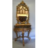 A French Gilded Demilune Console Table the shaped oval scroll form mirror above a marble top, the