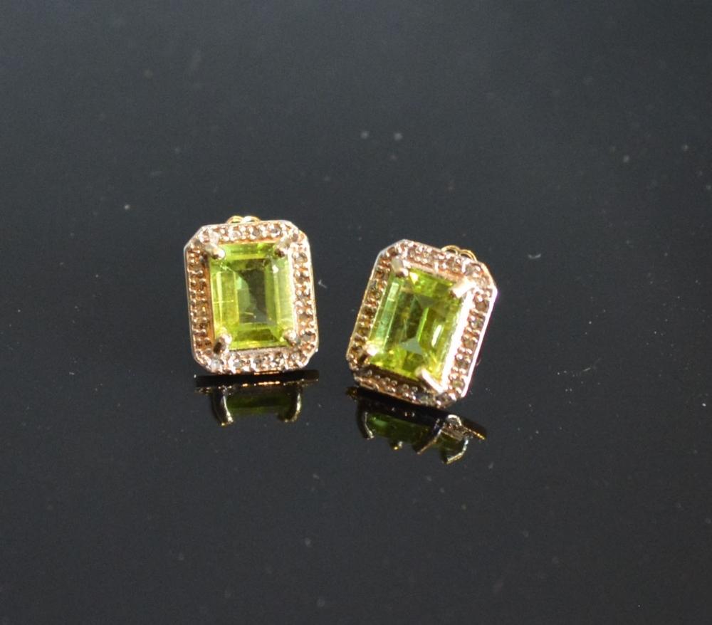 A Pair Of Yellow Gold Peridot And Diamond Set Ear Studs of rectangular form claw set