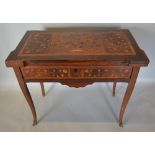 A French Kingwood and Marquetry Inlaid Card Table, the hinged top above a marquetry inlaid frieze
