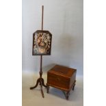 A 19th Century Mahogany Pole Screen The Tapestry Panel above tripod legs, together with a mahogany