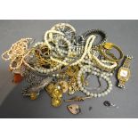 A Collection Of Costume Jewellery to include brooches, necklaces and a ladies wrist watch