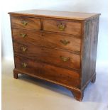 A George III Mahogany Chest The Molded Top Above Two Short and three long drawers with brass handles