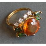An 18ct. Gold, Citrine, Tourmaline and Diamond Cluster Ring, 7.6g