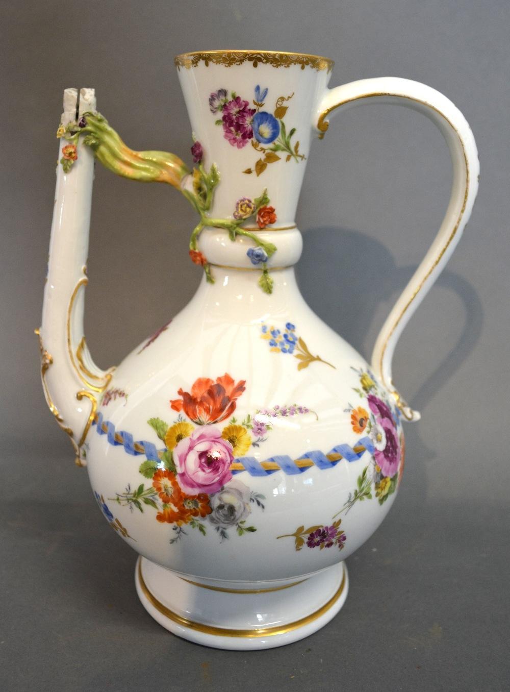 A 19th Century Meissen Porcelain Jug Handpainted With Summer Flowers and highlighted with gilt, blue