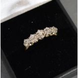 An 18ct. Gold Five Stone Diamond Ring With Five Graduated Diamonds Claw Set