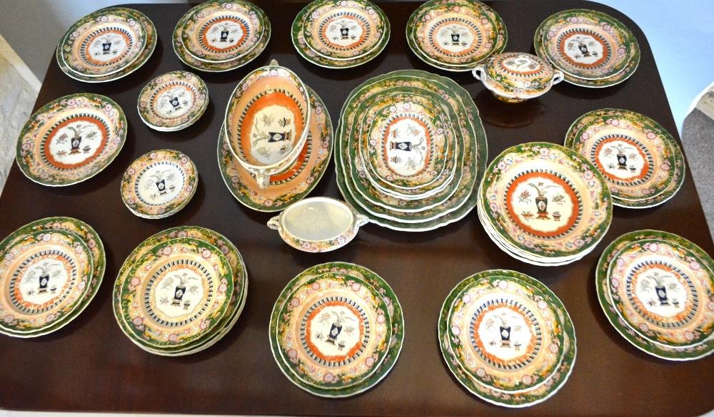 An Early 19th Century Ironstone Dinner Service comprising fifteen dinner plates, eleven side plates,