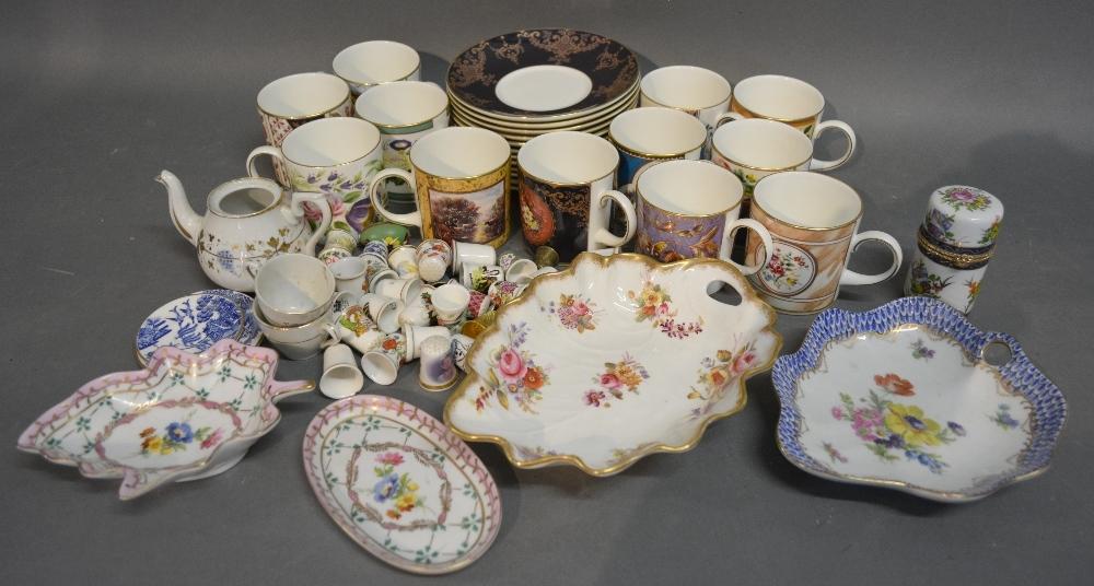 A Collection Of Twelve Coalport Commemorative Coffee Cans with saucers, together with a small