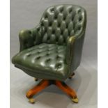 A Green Leather Button Upholstered Studded Revolving Office Armchair